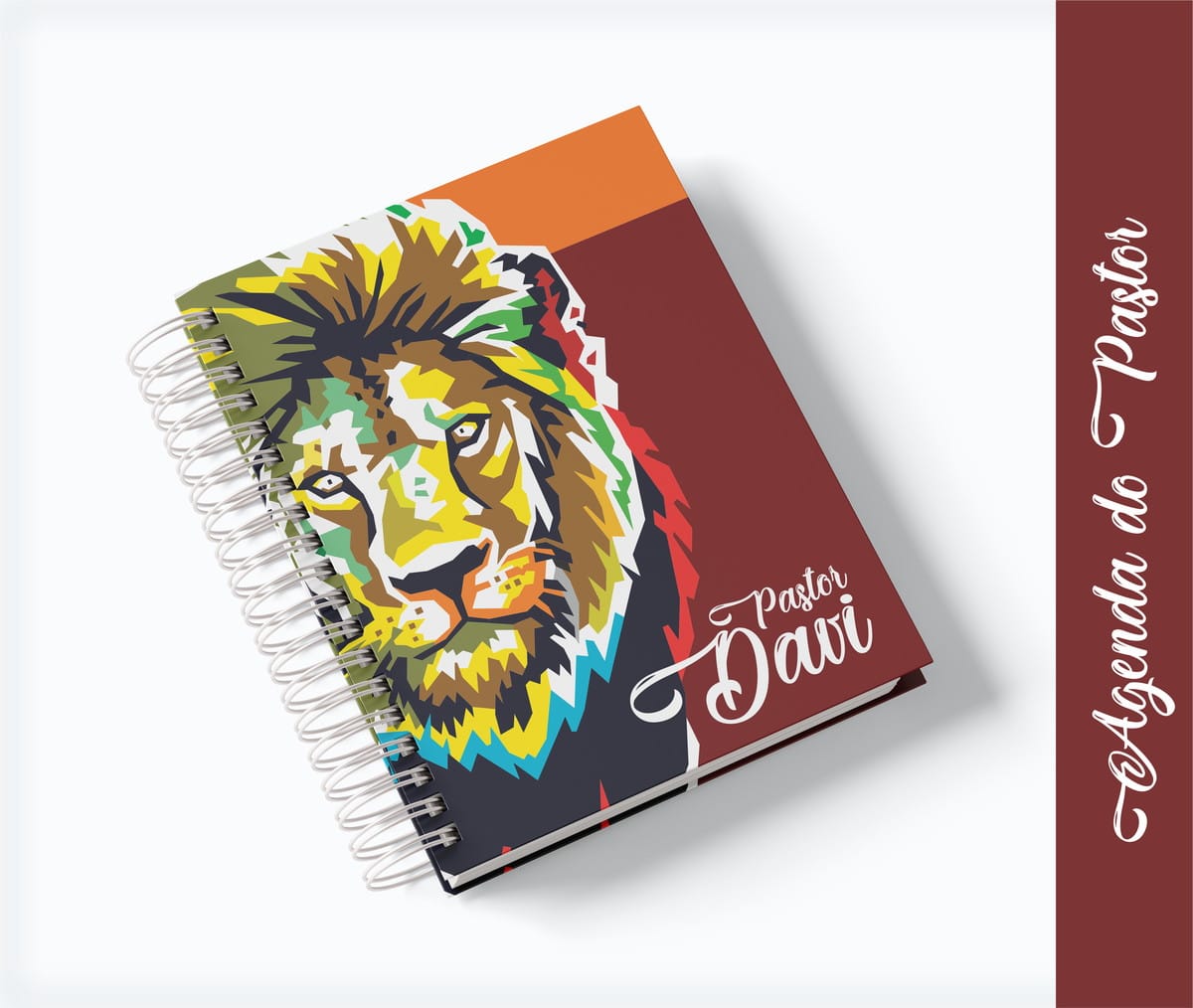 Agenda Digital Pastor com Arte para Caneca e Sublimação 1 Agenda de capa dura com arte digital de leão colorido e espiral prateada.