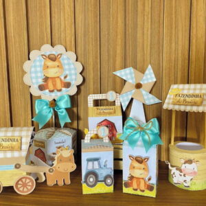 Decorações de papelaria criativa com tema fazendinha, apresentando animais e construções rurais.