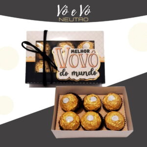 Caixa de presente com bombons embalados em papel dourado metálico