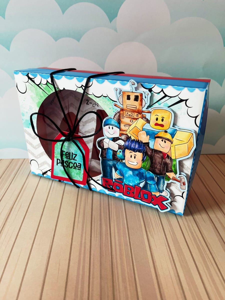 Caixa Mini Confeiteiro Roblox Menino em Arquivo Digital 2 Caixa de presente digital decorada com personagens de jogo e etiqueta 'Feliz Páscoa'.
