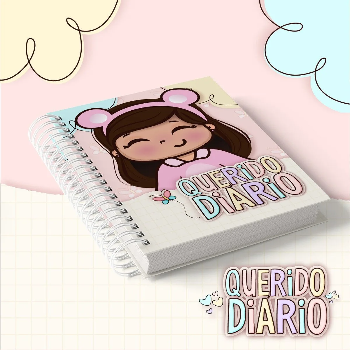Caderno espiral com ilustração de menina e texto escrito querido diário em destaque.