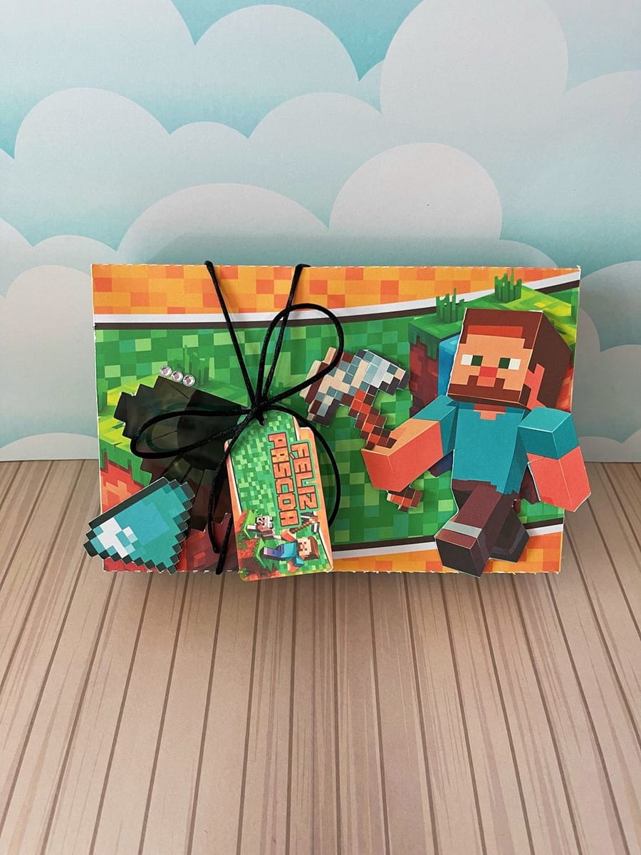 Kit Digital Mini Confeiteiro Minecraft para Doces 3 Caixa decorada com tema de jogo pixelado, personagem e ferramentas, com etiqueta de Páscoa.
